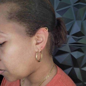 Ear helix and lobe two ring piercing with gold plated surgical steel hoop at Lethal Ink Tattoo Pattaya. Ear helix and lobe two ring piercing with gold plated surgical steel hoop at Lethal Ink Tattoo Pattaya (2026)