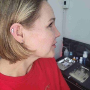 Ear helix single ring piercing with three gem surgical steel stud at Lethal Ink Tattoo Pattaya. Ear helix single ring piercing with three gem surgical steel stud at Lethal Ink Tattoo Pattaya (2026)