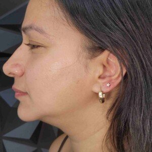 Ear lobe single ring piercing with star stud on left ear at Lethal Ink Tattoo Pattaya. Ear lobe single ring piercing with star surgical steel stud on left ear at Lethal Ink Tattoo Pattaya (2026)