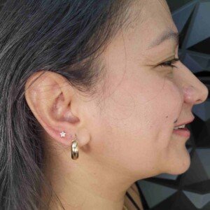 Ear lobe single ring piercing with star stud on right ear at Lethal Ink Tattoo Pattaya. Ear lobe single ring piercing with star surgical steel stud on right ear at Lethal Ink Tattoo Pattaya (2026)
